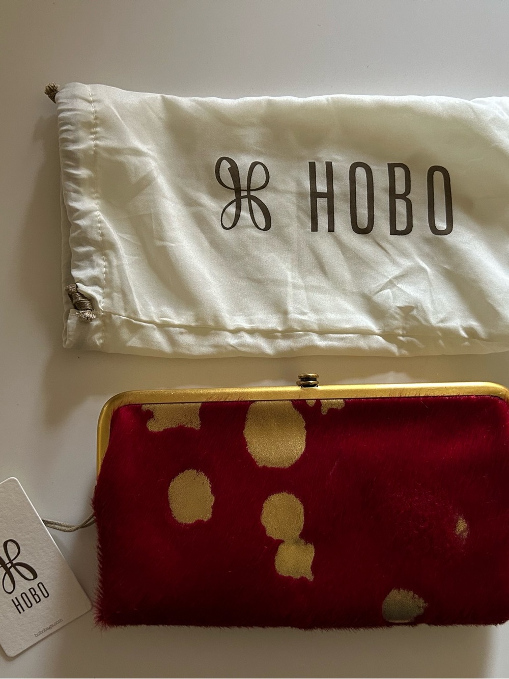 HOBO Lauren Gold Leaf and Cowhide Clutch